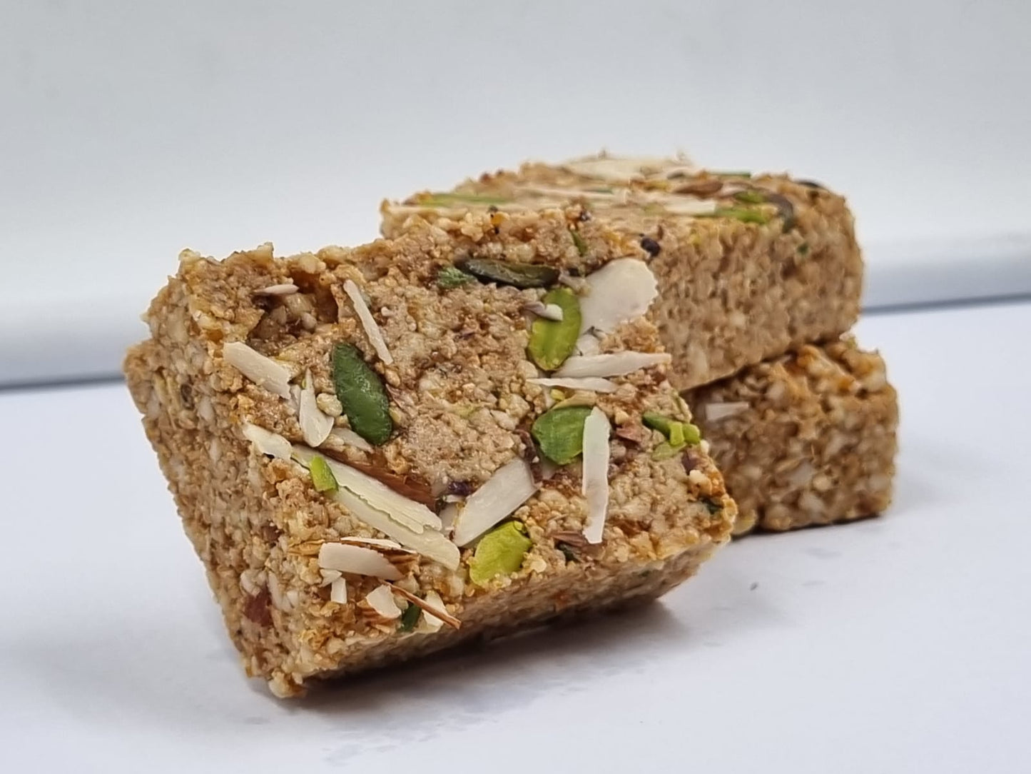 Close-up view of Rajwadi Barfi pieces showing rich texture and ingredients
