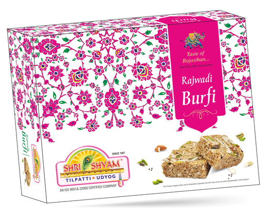 A box of Rajwadi Barfi by Shree Shyam with a floral pattern on the cover, showing the product name and a small image of the barfi pieces.