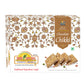 Chocolate peanut chikki 500g box with chikki pieces on wooden table