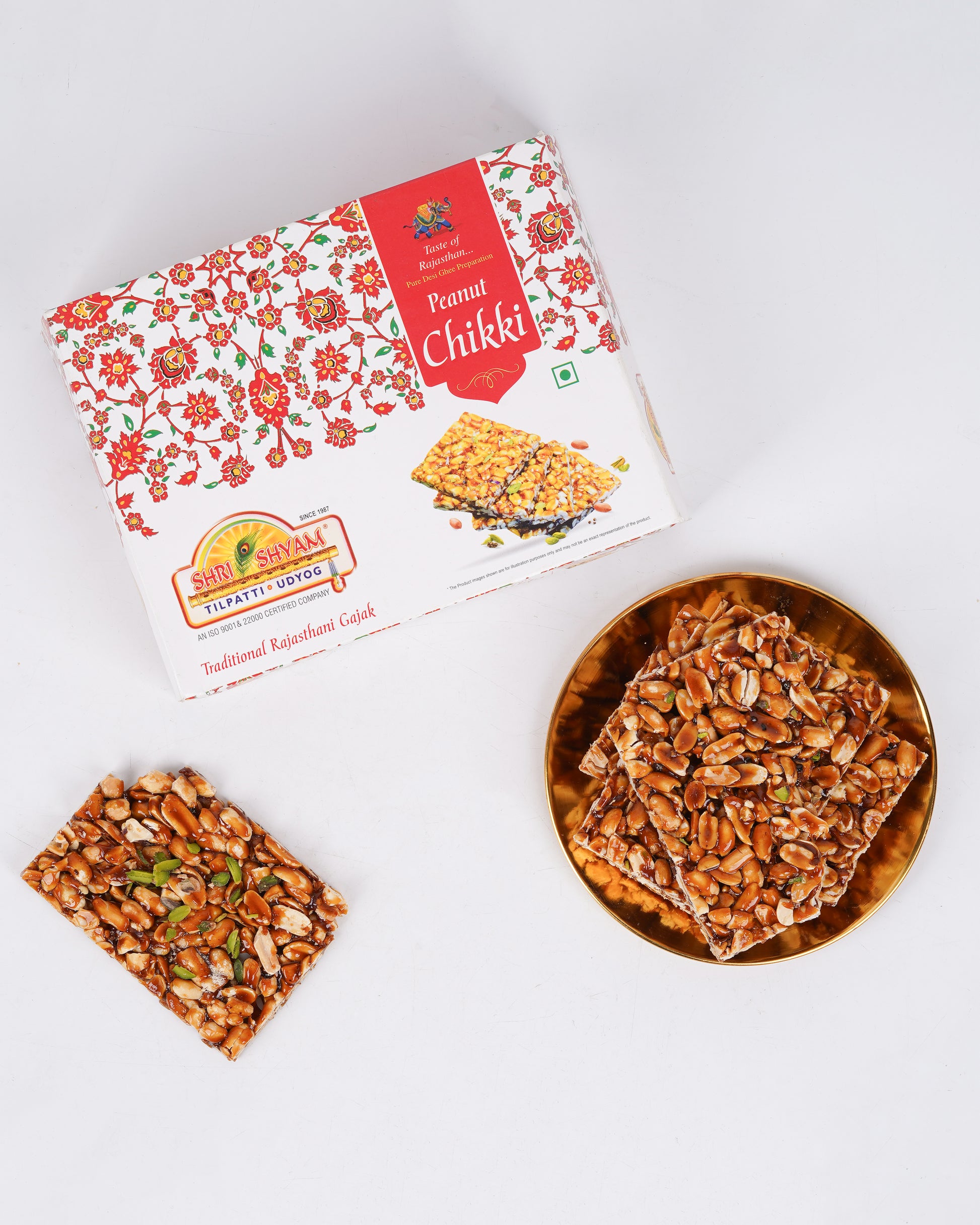 Peanut jaggery chikki 500g box with crispy chikki pieces