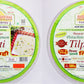 Front view of Pistachio Cardamom Tilpatti pack with ingredients