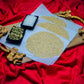 Tilpatti with cardamom and sesame displayed on red cloth background