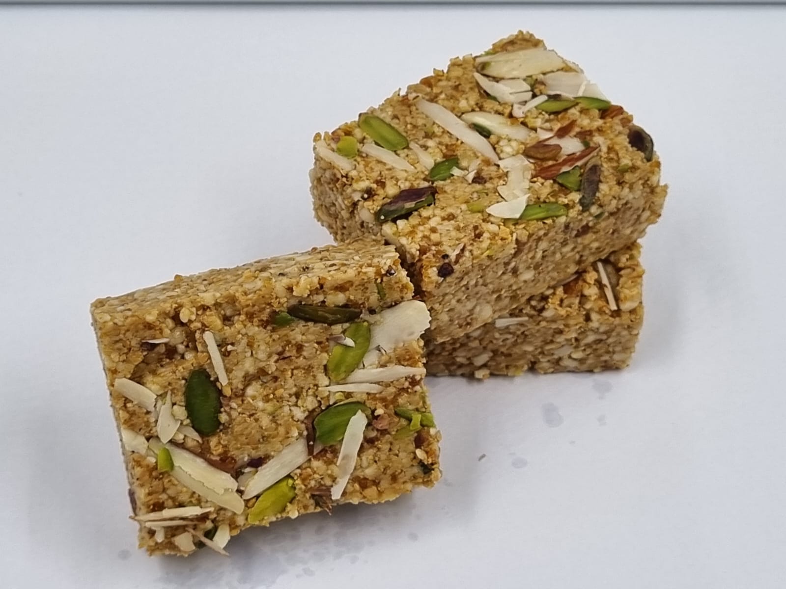 Close-up view of Rajwadi Barfi pieces showing rich texture and ingredients