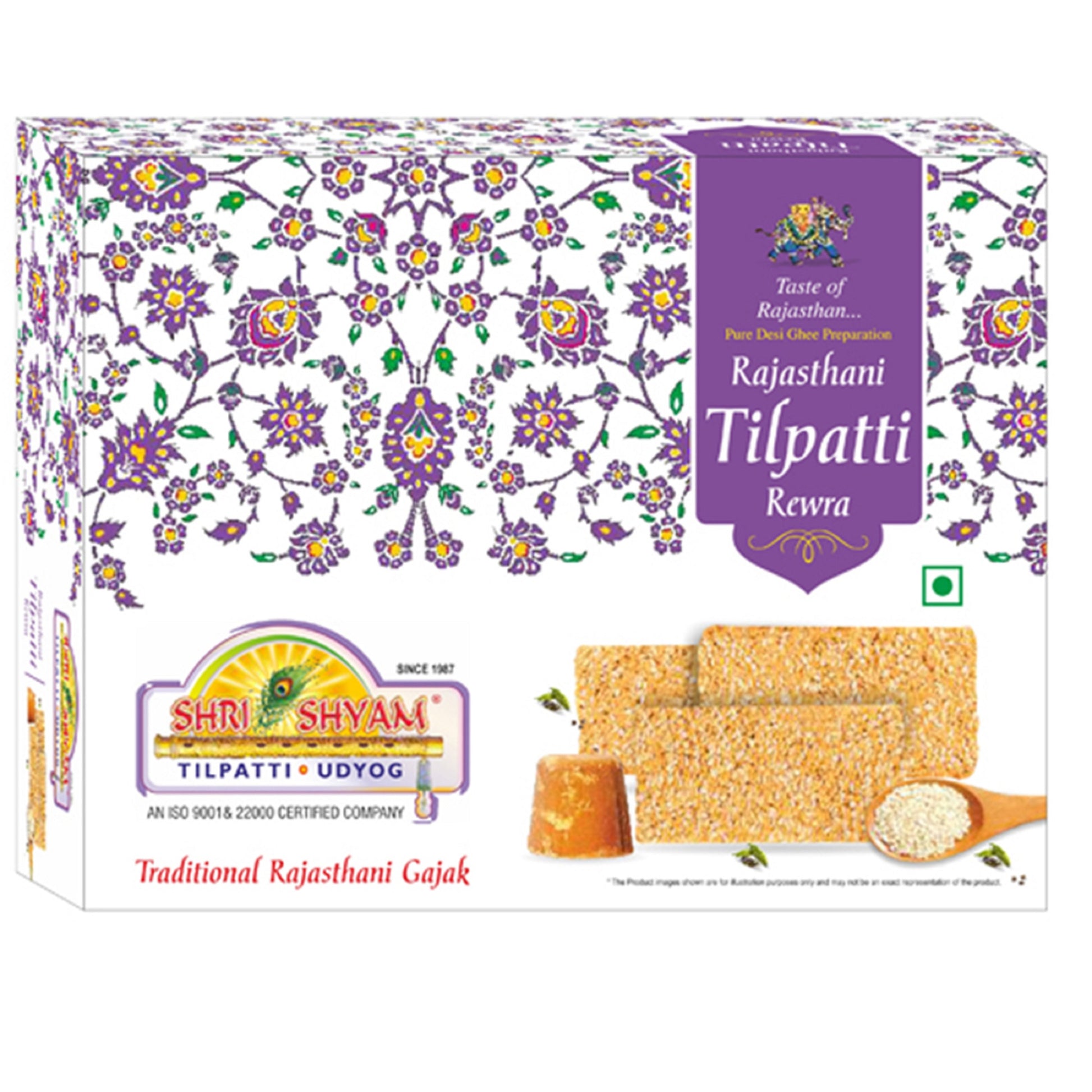 Rajasthani Rewra 500g box with sesame sweet pieces on wooden board