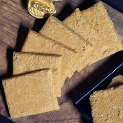 Crispy Biscuit Gajak slices made with sesame & jaggery – premium winter sweet